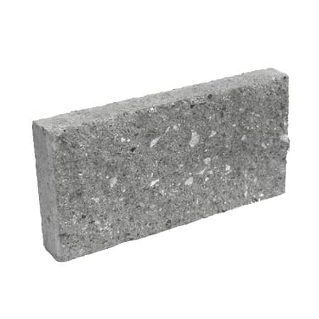 Блок полнотелый с двумя гранями колотой фактуры Besser на сером цементе